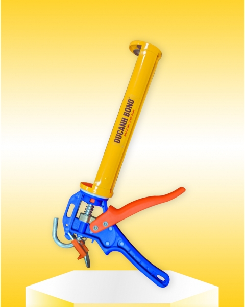  XI.  Súng bắn keo